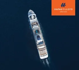 Fragen und Antworten zu Hapag-Lloyd Cruises. Auf dem Bild: MS EUROPA 2 und das Logo.