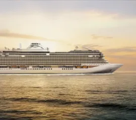 Ein Rendering der Seven Seas Prestige auf offenem Meer im Sonnenuntergang.