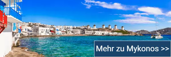 Zum Artikel über Mykonos Panorama von Mykonos-Stadt mit den berühmten Windmühlen im Hintergrund.