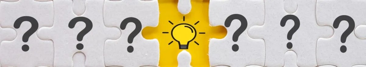 Fragezeichen als Symbolbild für die Trinkgeldregeln auf Kreuzfahrten Eine Grafik einer Reiehe von Puzzleteilen mit Fragezeichen und Glühbirne in der Mitte.