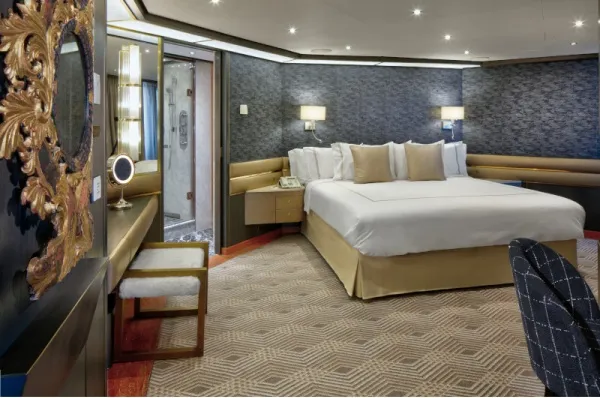 Eine Suite mit Doppelbett auf der Nieuw Amsterdam.