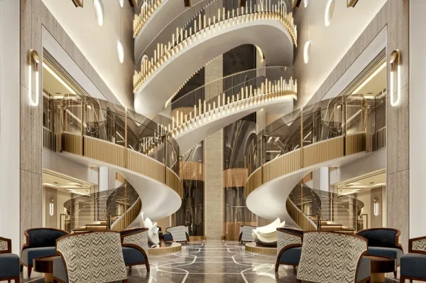 Atrium Seven Seas Prestige Das Atrium auf der Seven Seas Prestige mit luxuriösen Wendeltreppen und Lichtakzenten.