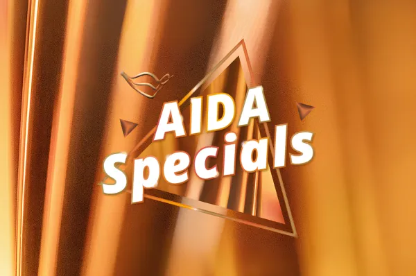 5 Gründe für Ihre Eventkreuzfahrt mit AIDA Logo der AIDA Specials vor einem goldenen Hintergrund.