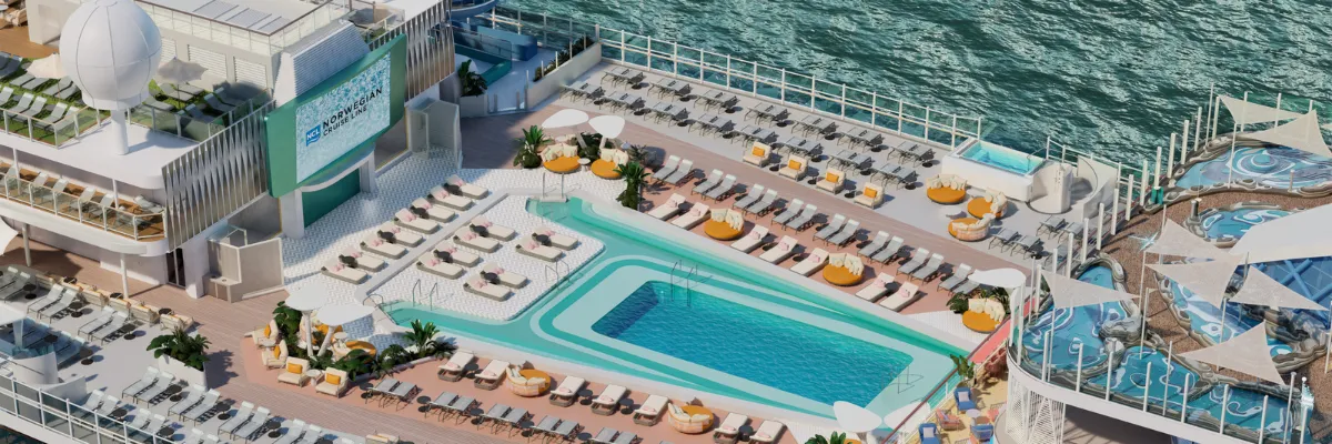 All Inclusive Kreuzfahrt mit Norwegian Cruise Line Das obere Deck der Norwegian Aqua, mit Pool, Leinwand, Wasserrutschen und vielen Sonnenliegen.